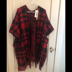 Poncho style buffalo check sweater